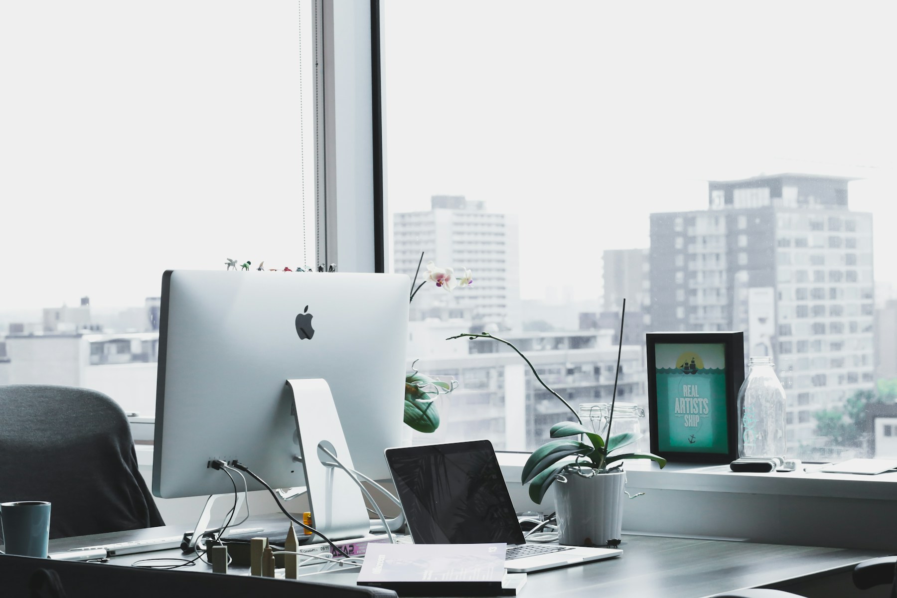 Studio worktable where notes and personal data are read with care
